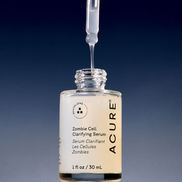 ACURE Zombie Cell Clarifying Serum bottle with dropper on a gradient blue background